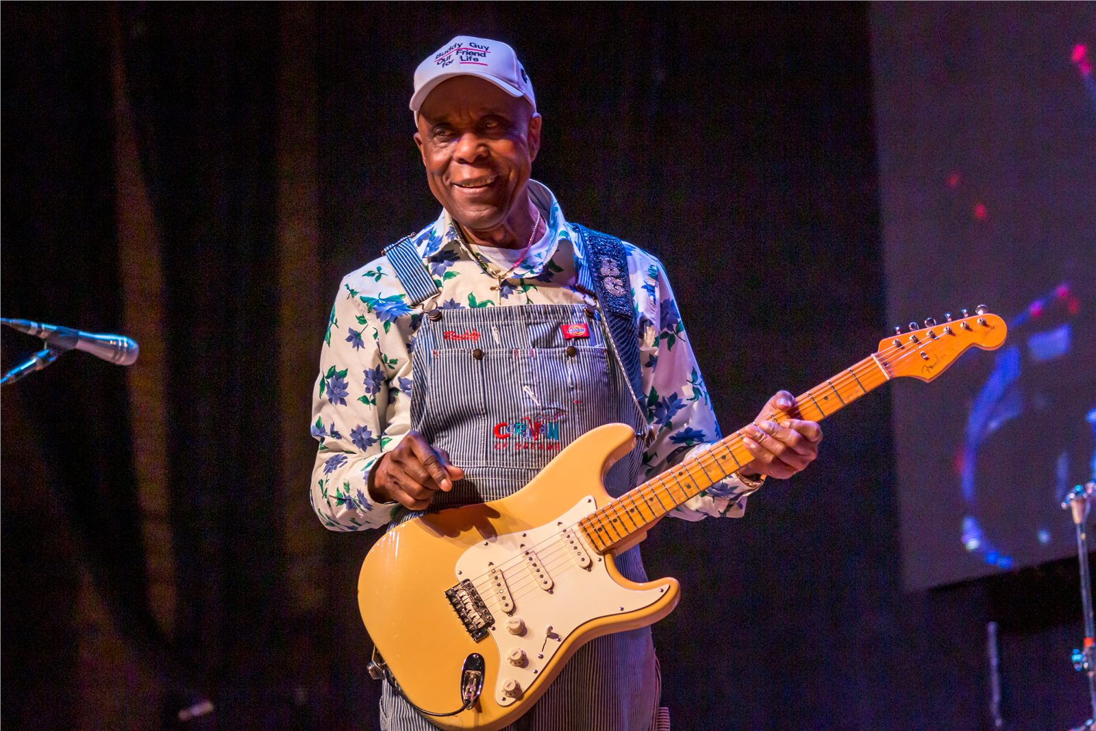 Buddy Guy performing with an electric guitar on stage